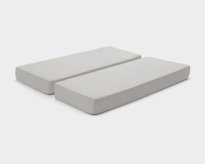 Adjustable bed fitted sheets by It-Fits in neutral Beige, displayed on a split mattress with deep pockets against a simple backdrop.
